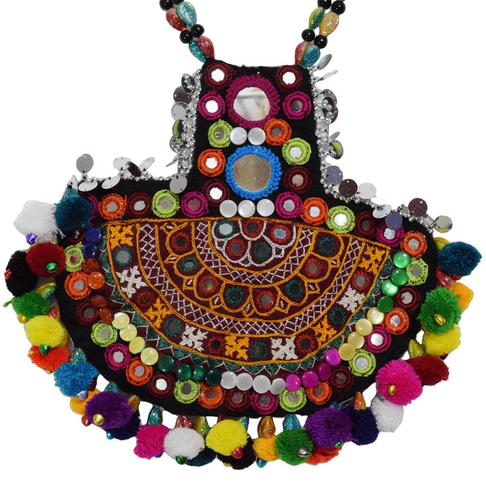 A multicolored beaded purse with tassels and beads
