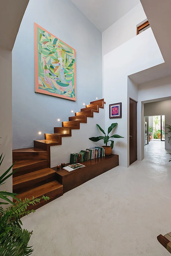 Casa Picasso : A room with a staircase and a painting on the wall

