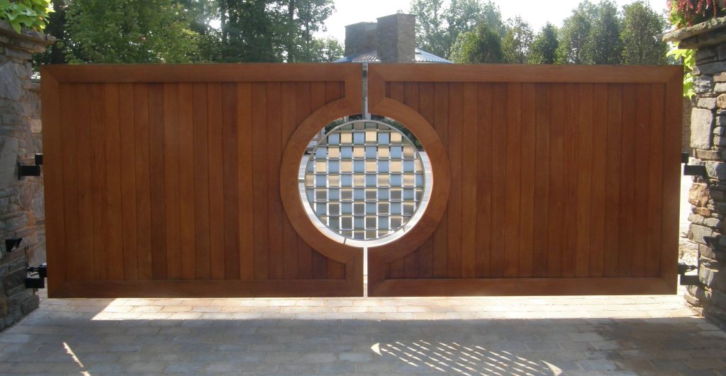 Huge Wooden Gate With Glass Design in the Middle