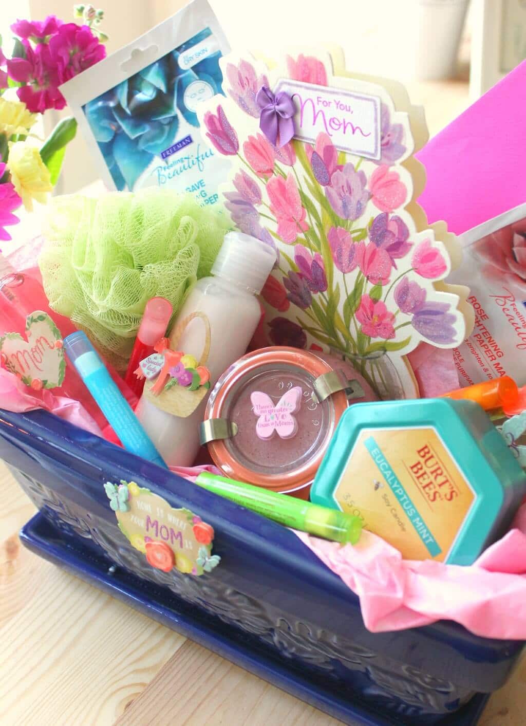 A blue basket filled with lots of different items
