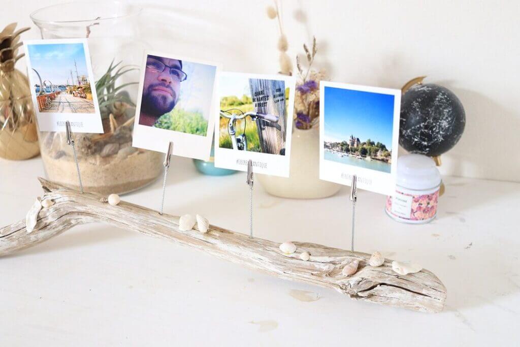 A group of pictures on a stick on a table

