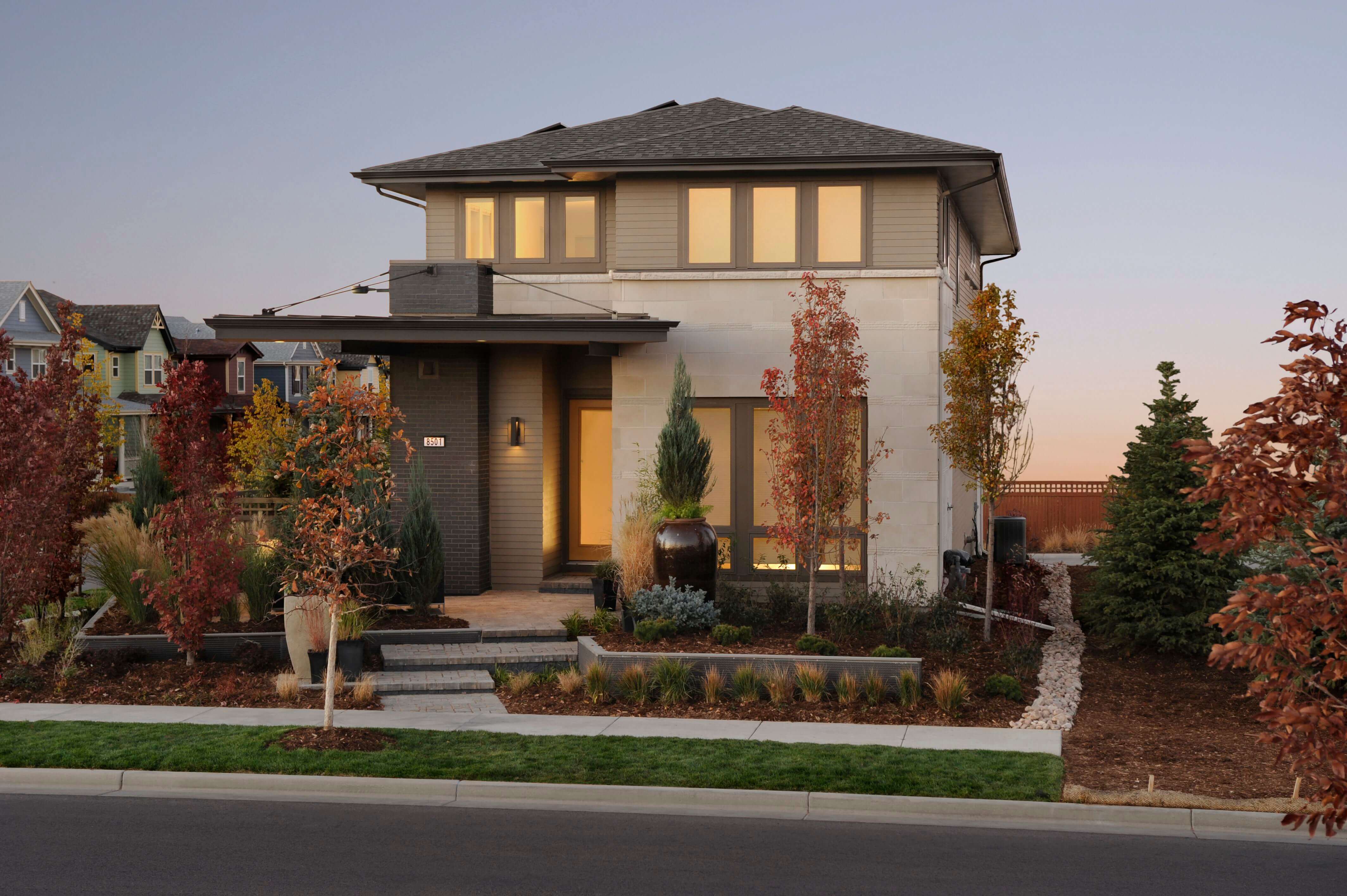 A house with a lot of trees in front of it
