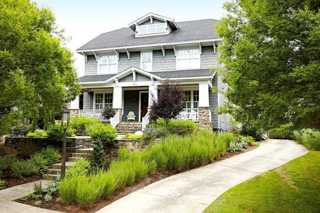 A house with a garden in front of it
