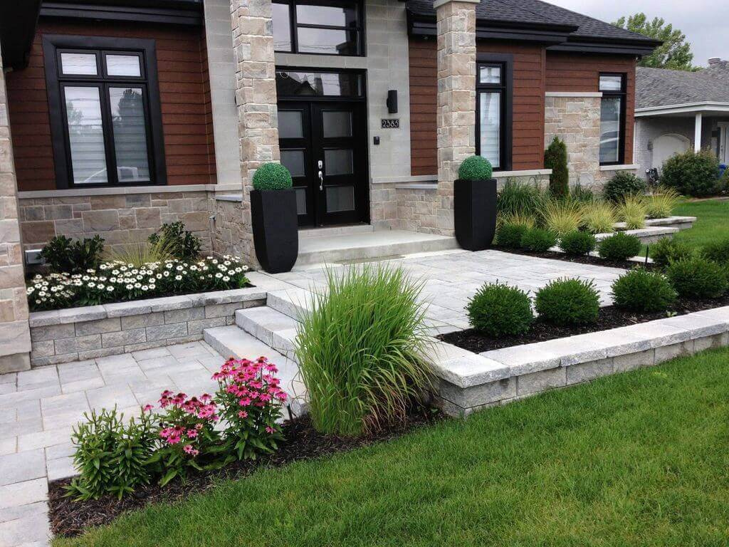 A house with a large front yard and landscaping
