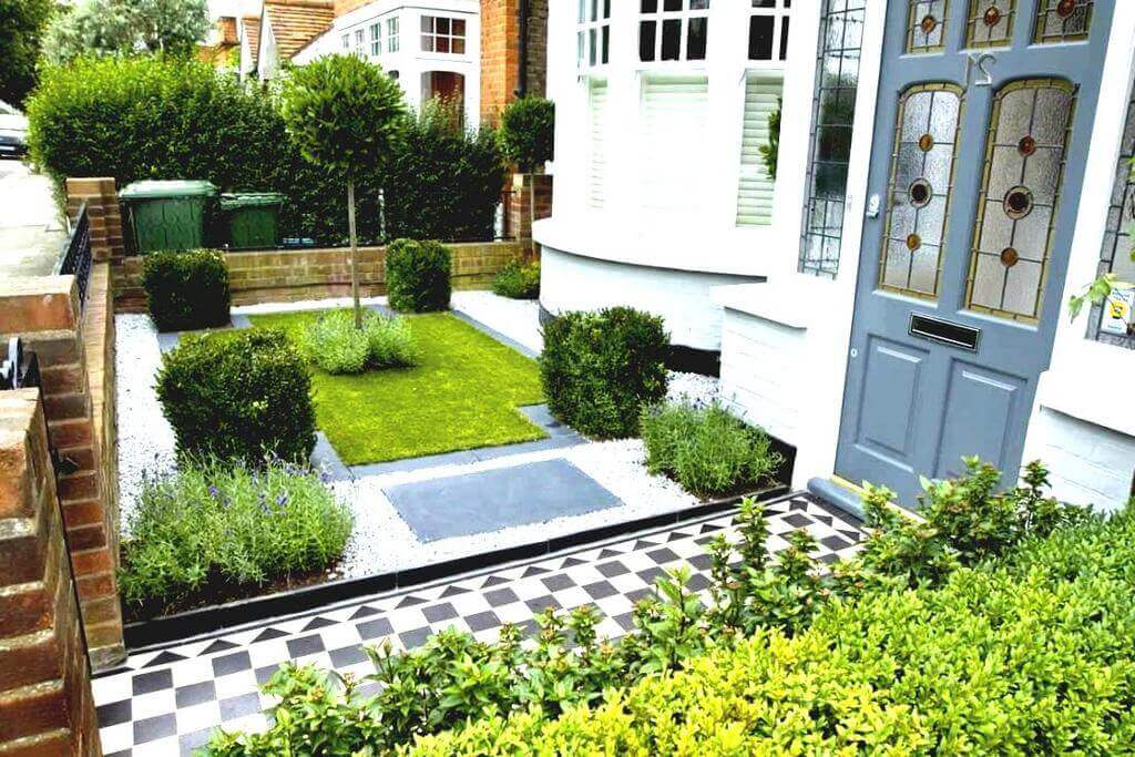 A garden with a checkered floor and a blue door
