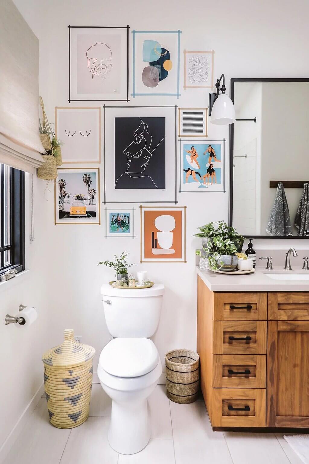 A white toilet sitting next to a bathroom sink
