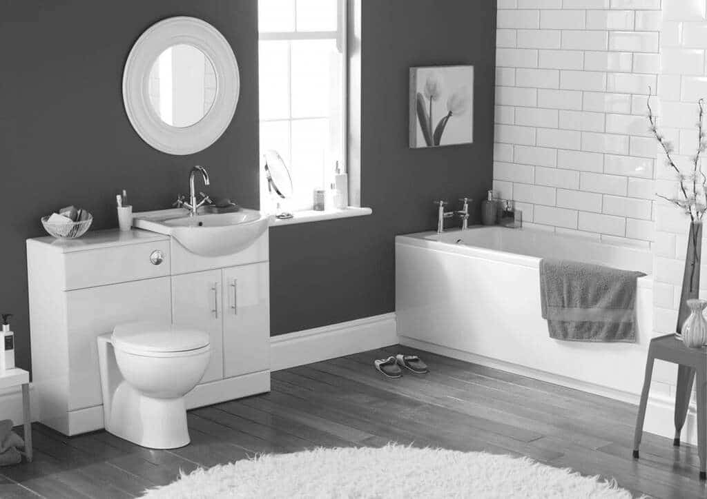 A black and white photo of a bathroom
