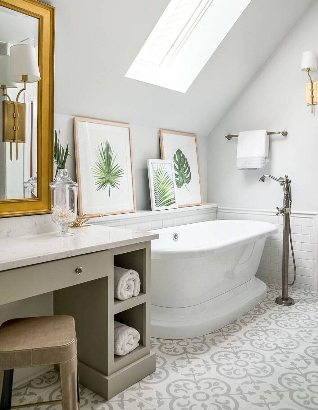 A bath room with a sink a mirror and a bath tub
