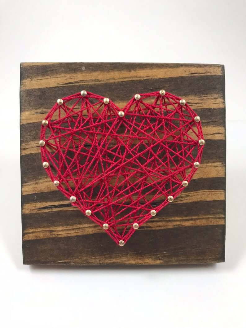 Heart String Art Patterns on table