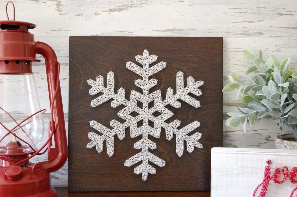 A picture of a snowflake on a table
