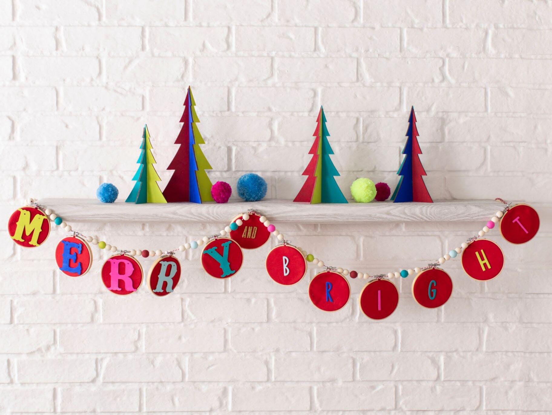 A white brick wall with christmas decorations on it
