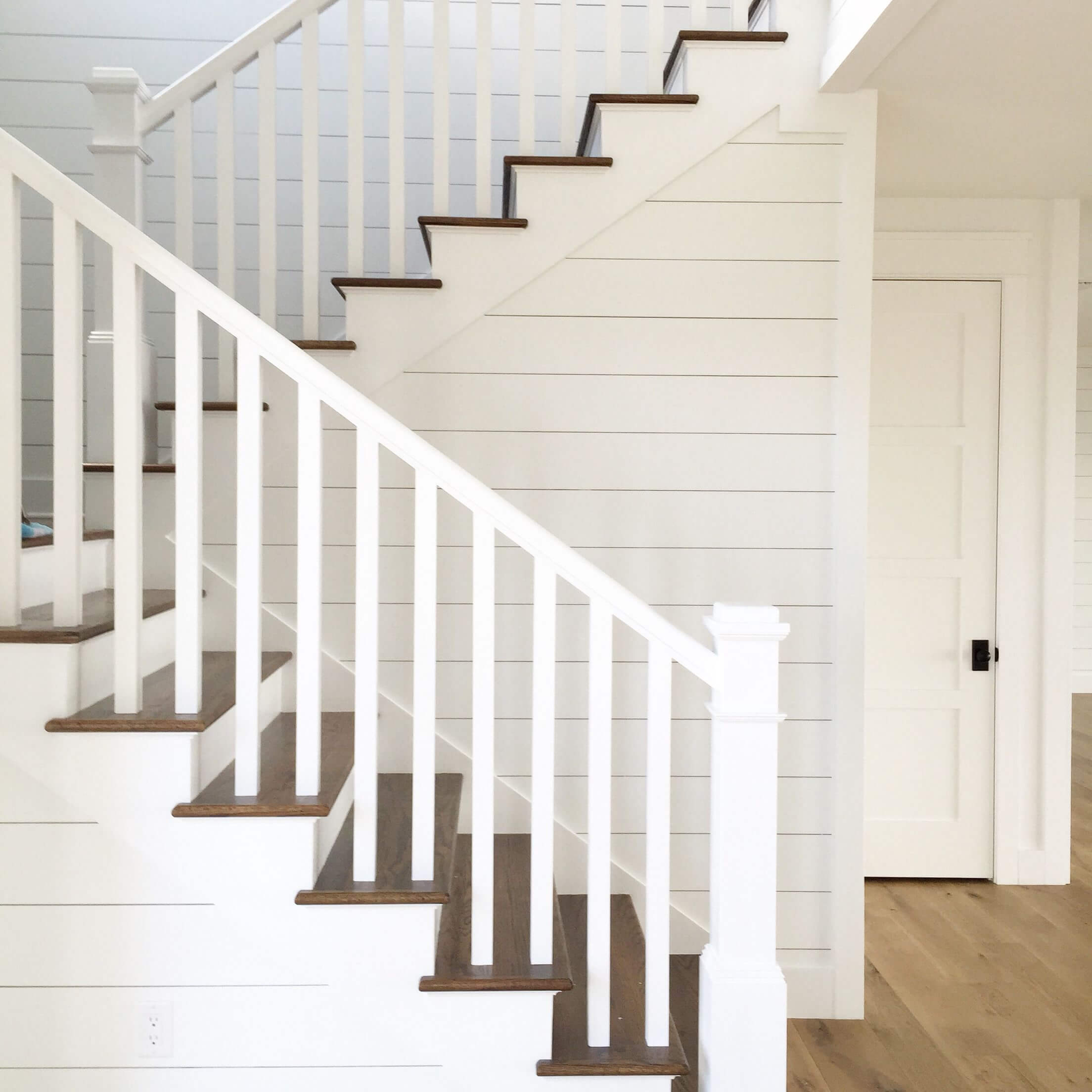 All white railing + staircases