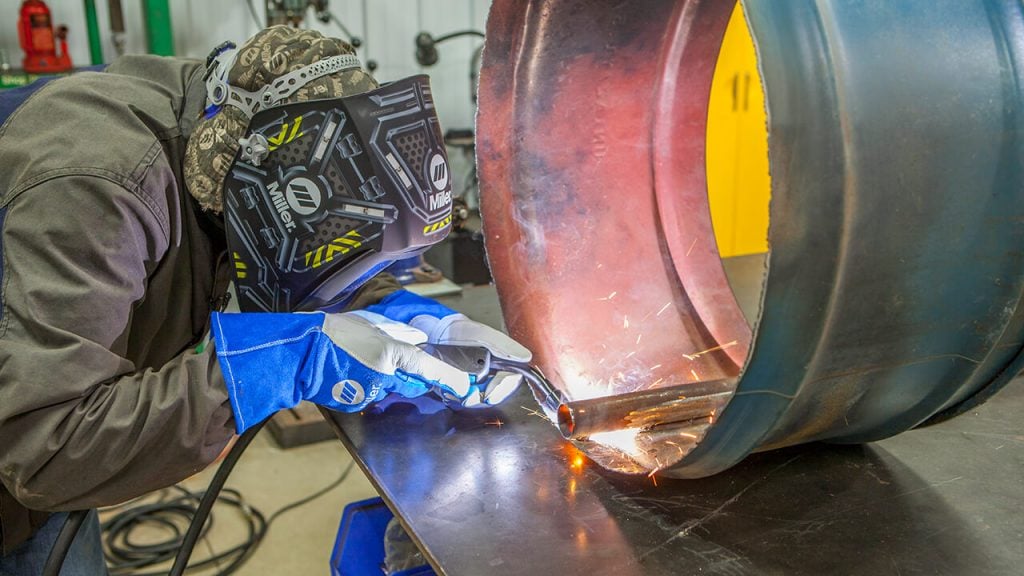 MIG welding with head and face protection