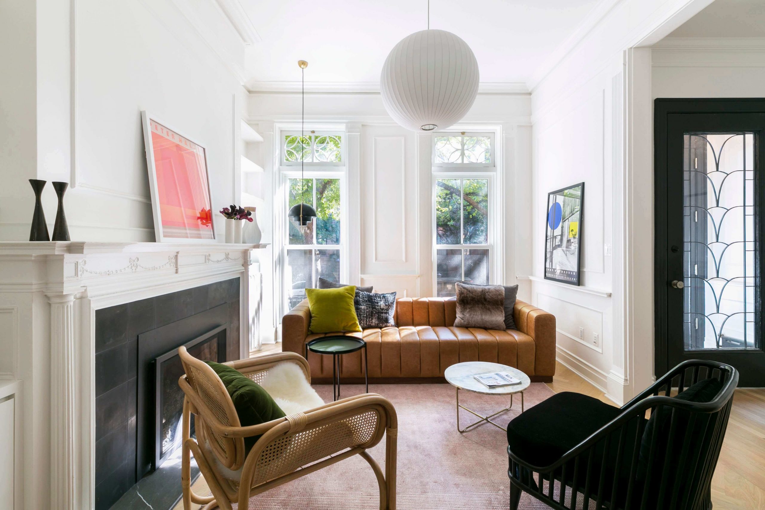 A living room filled with furniture and a fire place
