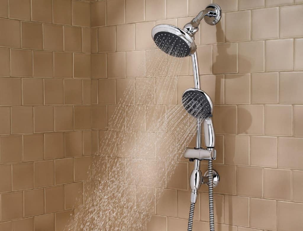 A shower head with a spray of water coming out of it
