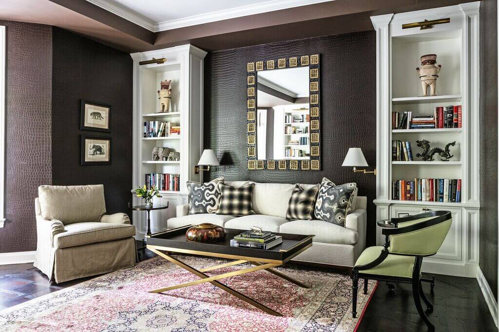 A living room filled with furniture and a large mirror
