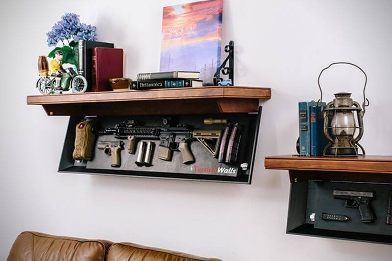 A couple of shelves that have guns on them
