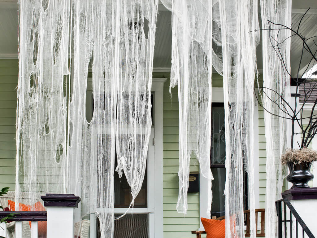 Billowing Ghostly Outdoor Draperies halloween porch 