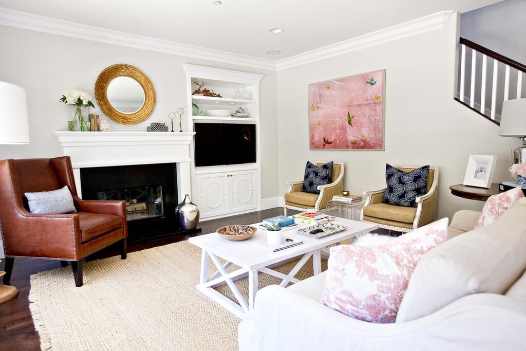 A living room filled with furniture and a fire place
