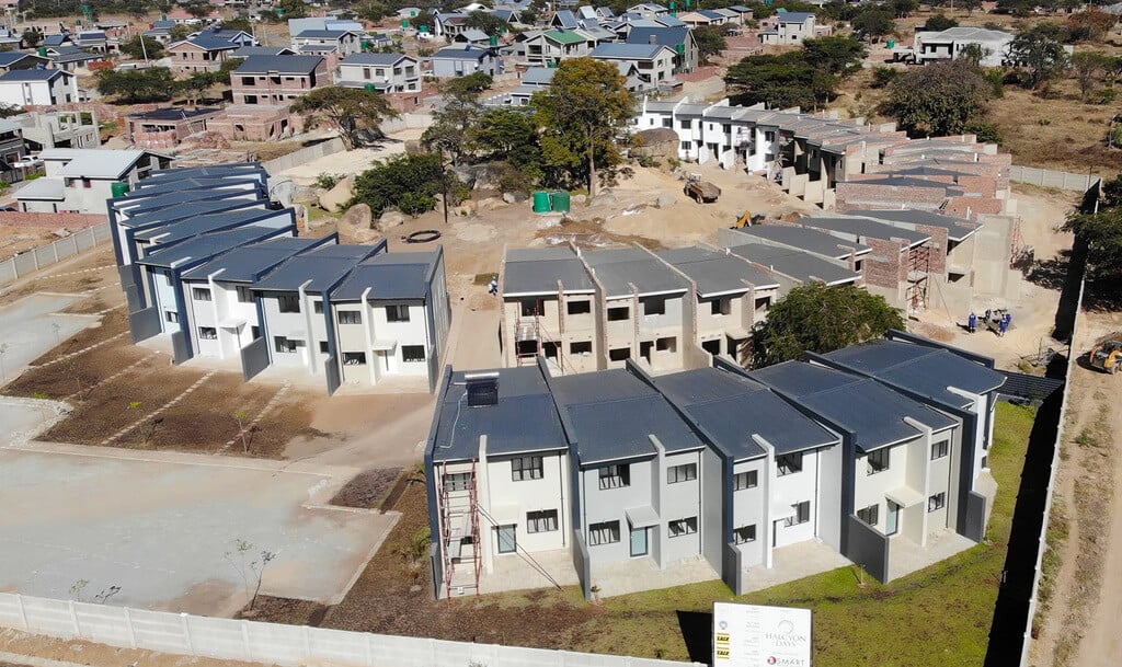 An aerial view of a  cluster housing  under construction
