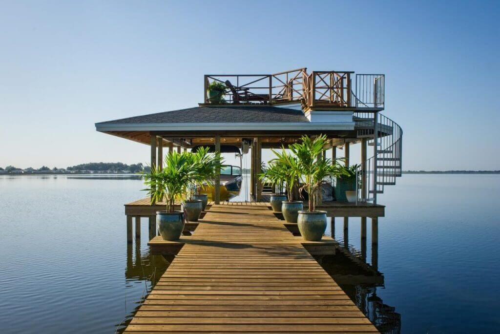 A dock with a house on top of it
