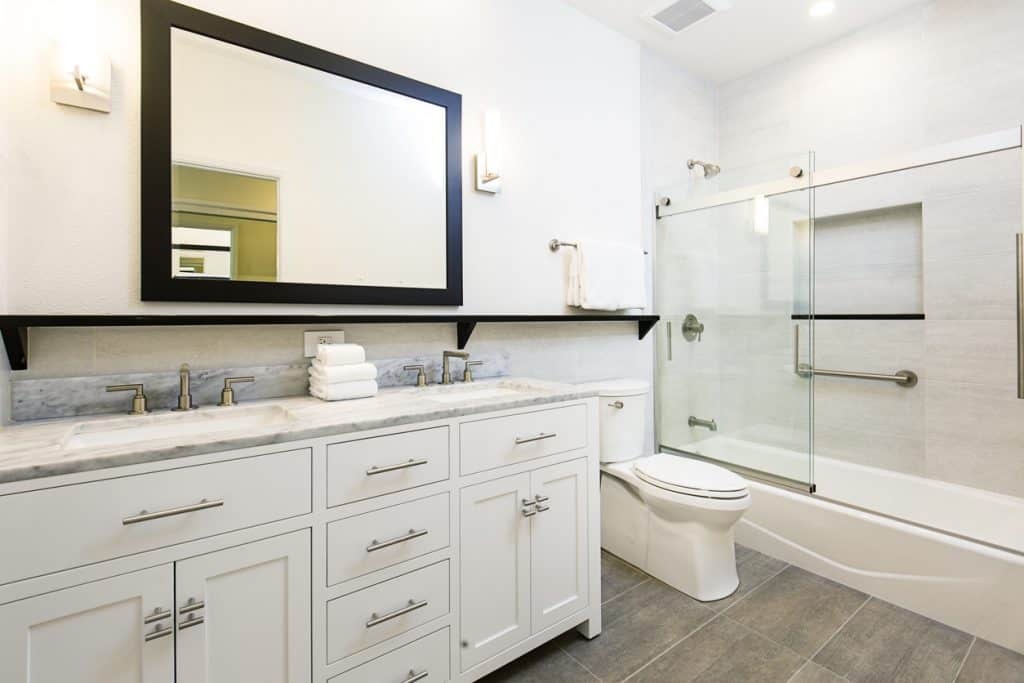 bath fitter bathroom with cabinet