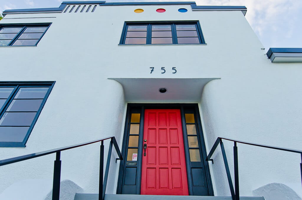 White and Black with Bright Red Door
