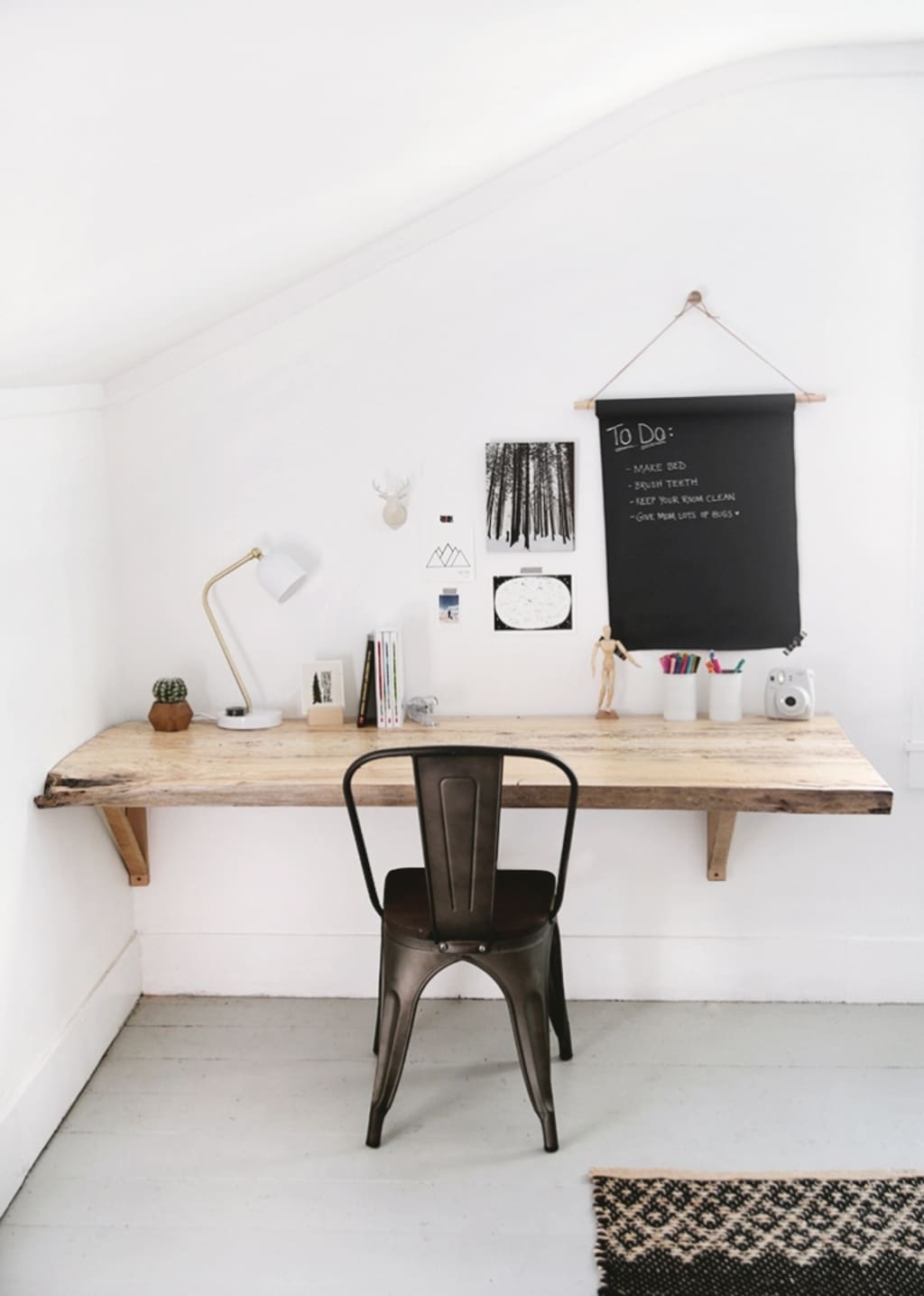 A desk with a chair and a live edge table
