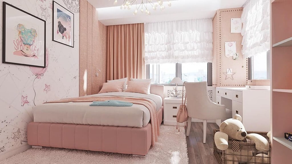 A bedroom with a pink and white theme
