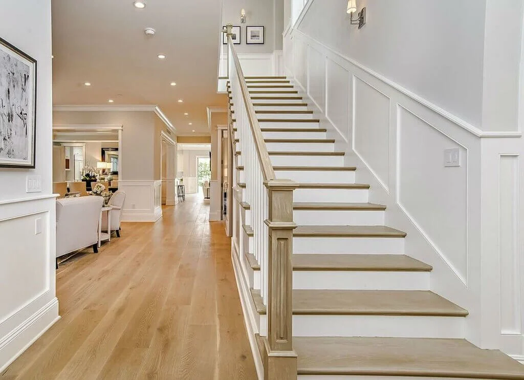 A staircase leading to a living room and dining room
