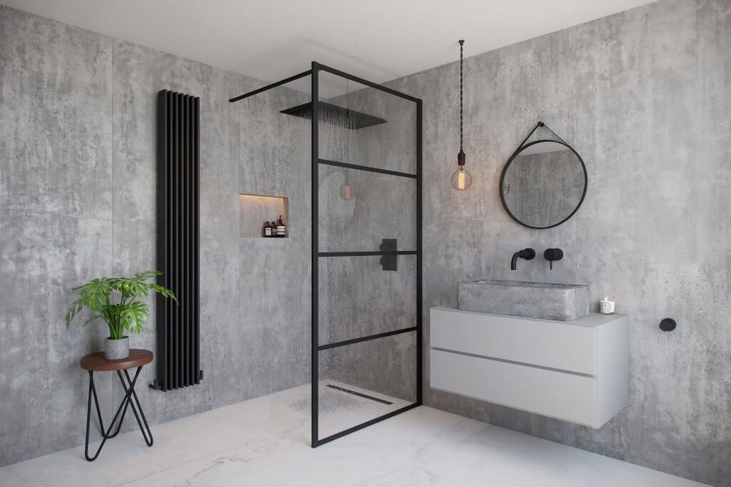 A bathroom with a sink, mirror and a radiator
