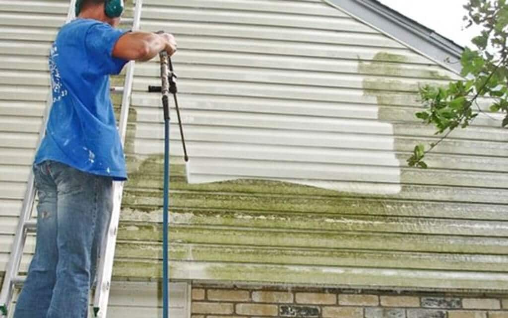 Power-Wash the Exterior in Home Repairs