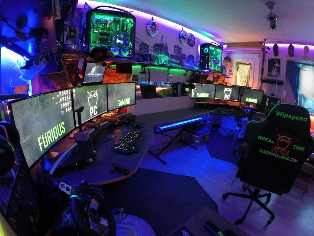 A room filled with lots of computer monitors
