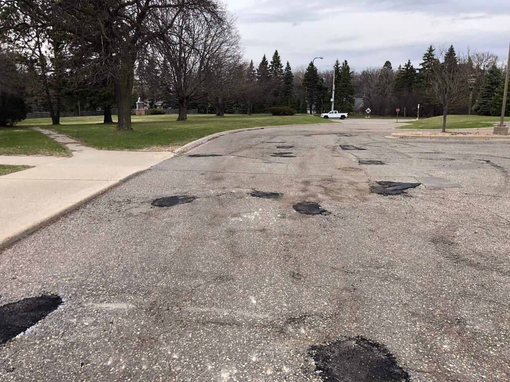 parking lot pothole repairs Fix Cracks Immediately They Form