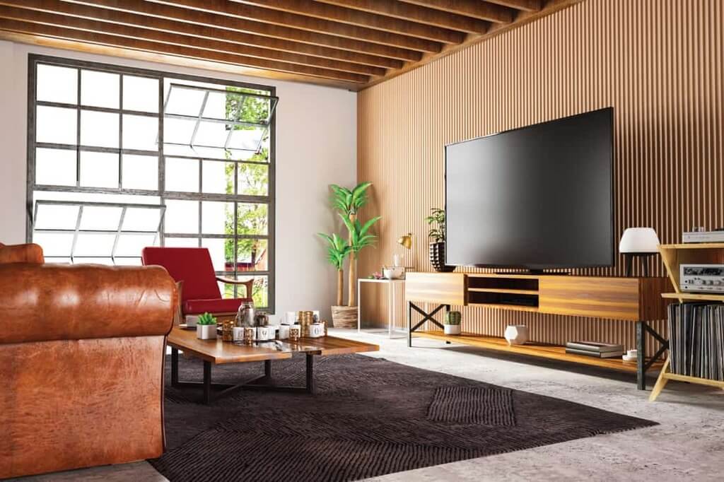 A living room filled with furniture and a flat screen tv
