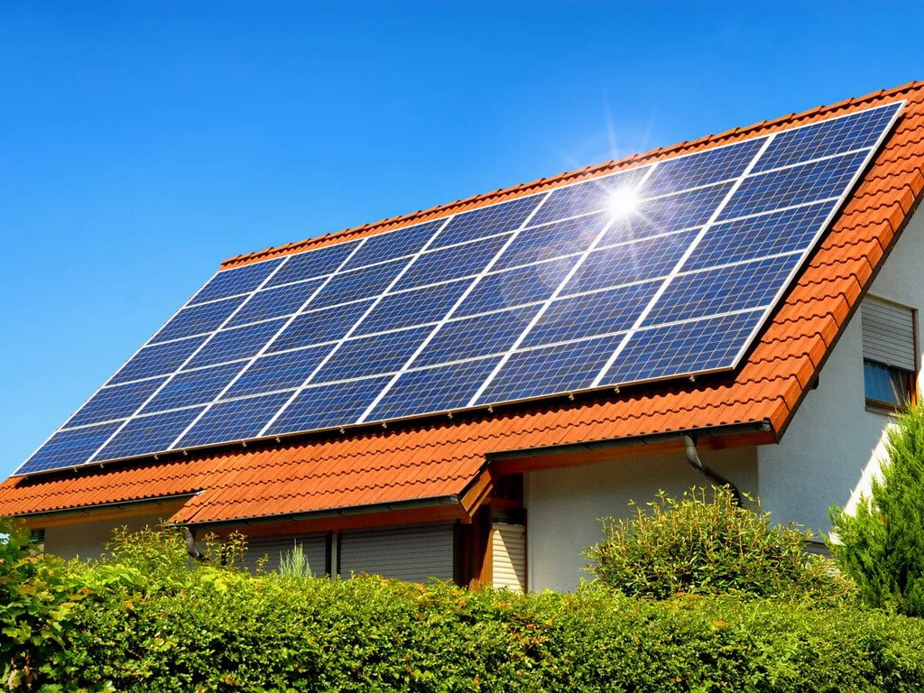 A house with a solar panel on the roof
