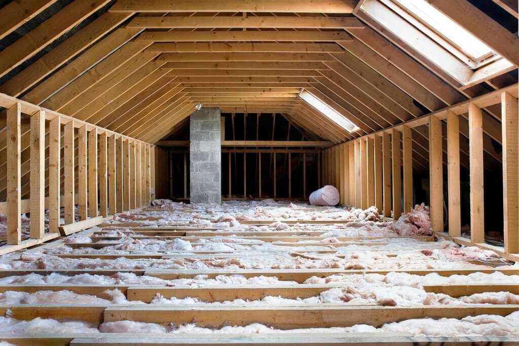 A Attic with a lot of insulation in it
