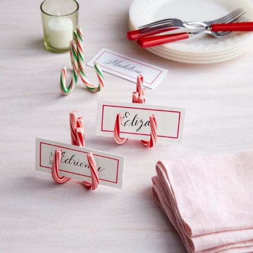 Place card holders with candy cane 